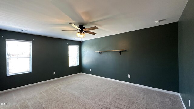 49 W Copenhaver Dr, Clayton, NC 27527 - spare room featuring carpet, a ceiling fan, and baseboards