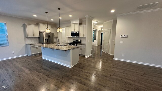 49 W Copenhaver Dr, Clayton, NC 27527 - kitchen with appliances with stainless steel finishes, a sink, ornamental molding, tasteful backsplash, and recessed lighting