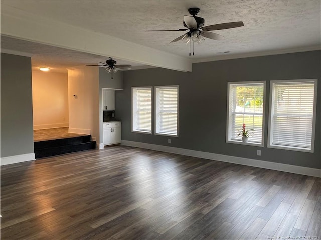 unfurnished living room with a healthy amount of sunlight, a textured ceiling, and ceiling fan
