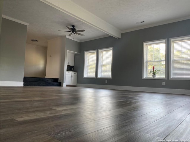 unfurnished living room with baseboards, wood finished floors, a ceiling fan, and ornamental molding
