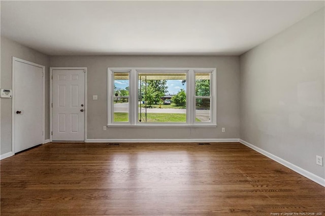 3518 Drayton Rd, Fayetteville, NC 28303 - interior space with visible vents, wood finished floors, and baseboards
