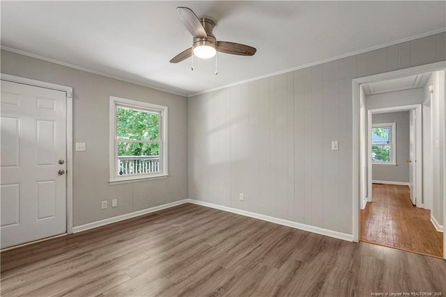 3518 Drayton Rd, Fayetteville, NC 28303 - unfurnished room with a ceiling fan, wood finished floors, visible vents, and ornamental molding