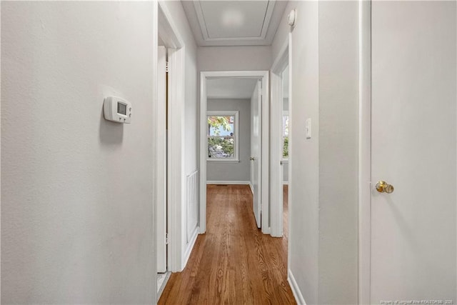3518 Drayton Rd, Fayetteville, NC 28303 - corridor featuring attic access, wood finished floors, and baseboards