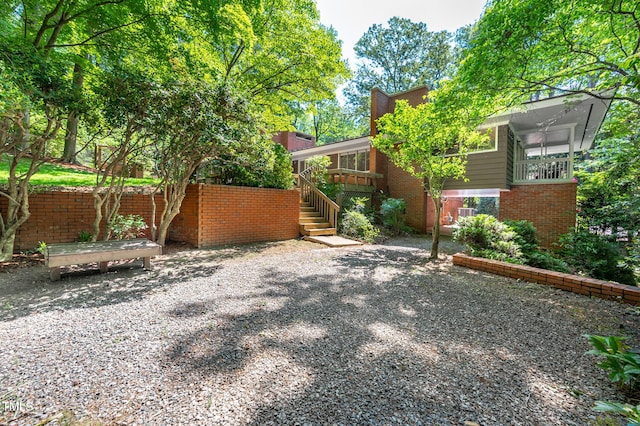 view of yard with stairs
