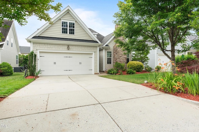 5233 Greymoss Ln, Apex, NC 27539 - traditional home with concrete driveway and a front lawn