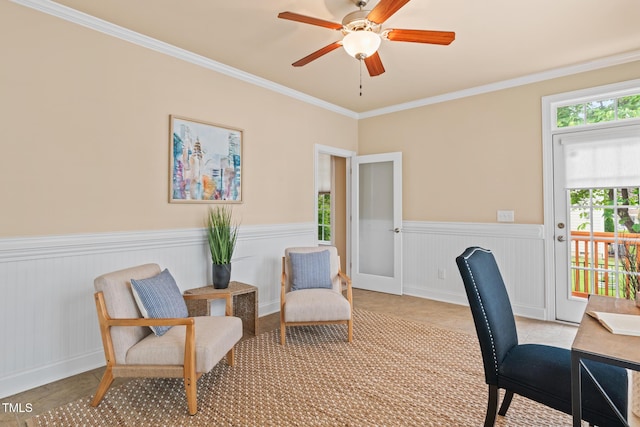 5233 Greymoss Ln, Apex, NC 27539 - home office featuring a wainscoted wall, ornamental molding, and a ceiling fan