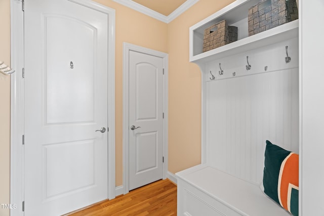 5233 Greymoss Ln, Apex, NC 27539 - mudroom with ornamental molding and light wood-style flooring