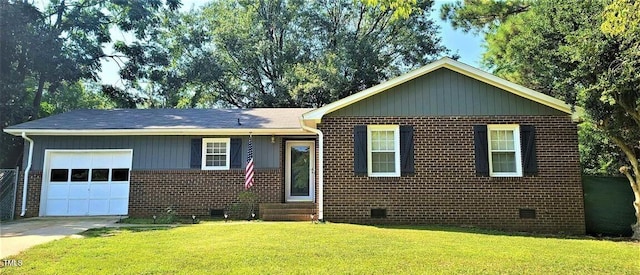 107 Ware Ct, Garner, NC 27529 - ranch-style home featuring a front yard, concrete driveway, an attached garage, brick siding, and crawl space