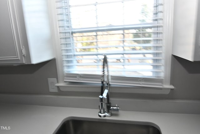 107 Ware Ct, Garner, NC 27529 - room details featuring light countertops and a sink