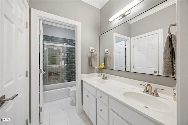 1508 Tradescant Ct, Raleigh, NC 27613 - bathroom with double vanity, crown molding, tile patterned flooring, and combined bath / shower with glass door