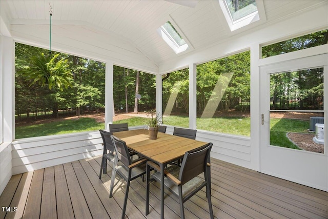 1508 Tradescant Ct, Raleigh, NC 27613 - sunroom / solarium with vaulted ceiling, a skylight, and outdoor dining space