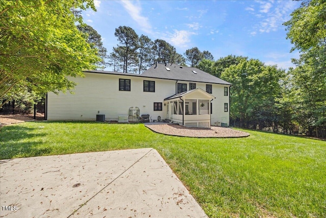 1508 Tradescant Ct, Raleigh, NC 27613 - rear view of house featuring a patio and a lawn