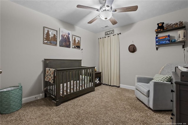 263 Autumn Ln, Raeford, NC 28376 - bedroom with carpet, baseboards, and a nursery area