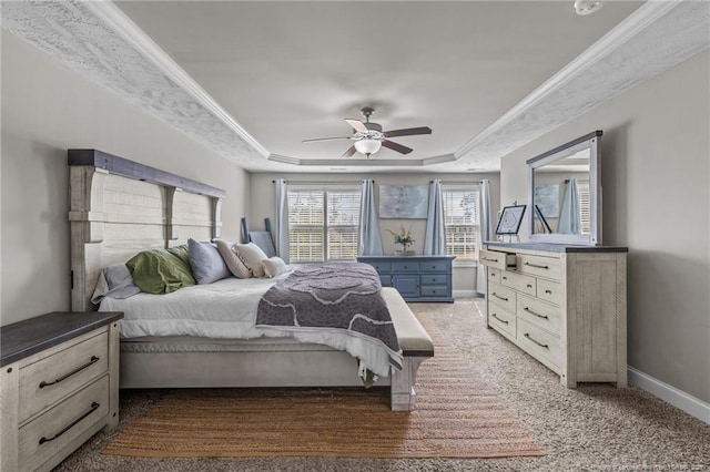 263 Autumn Ln, Raeford, NC 28376 - bedroom with a tray ceiling, carpet, baseboards, and a ceiling fan