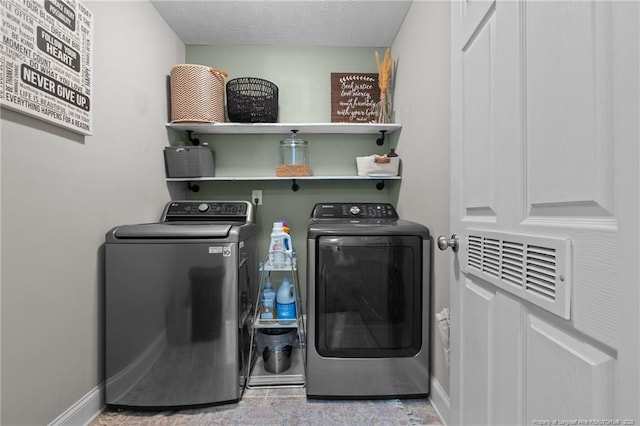 263 Autumn Ln, Raeford, NC 28376 - washroom with independent washer and dryer, baseboards, and a textured ceiling