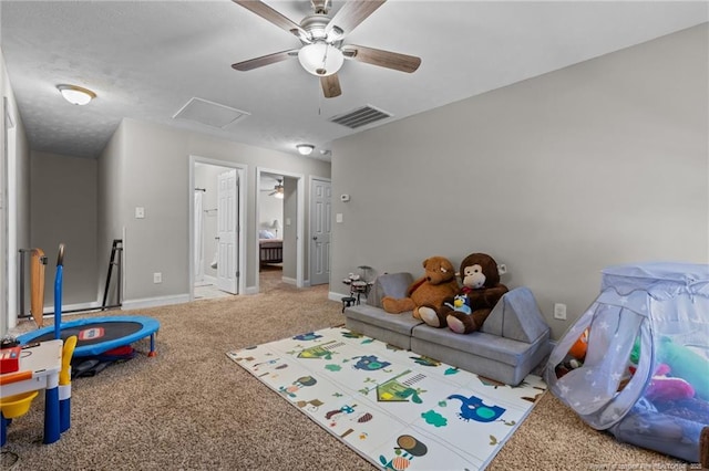 263 Autumn Ln, Raeford, NC 28376 - game room with ceiling fan, carpet floors, attic access, and baseboards