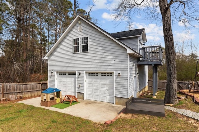 263 Autumn Ln, Raeford, NC 28376 - view of side of property featuring an attached garage and driveway