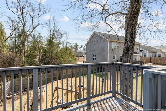 263 Autumn Ln, Raeford, NC 28376 - wooden terrace featuring a residential view and a fenced backyard