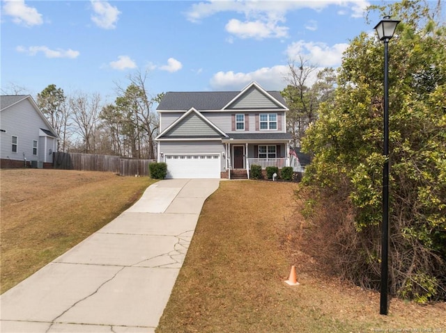 263 Autumn Ln, Raeford, NC 28376 - traditional home featuring concrete driveway and a porch