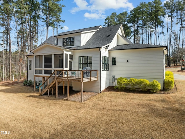 76 Gentry Dr, Pittsboro, NC 27312 - back of house with a lawn, a sunroom, stairs, and roof with shingles