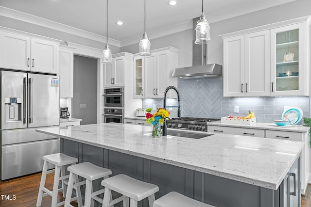 76 Gentry Dr, Pittsboro, NC 27312 - kitchen with decorative backsplash, wall chimney exhaust hood, white cabinets, and stainless steel appliances