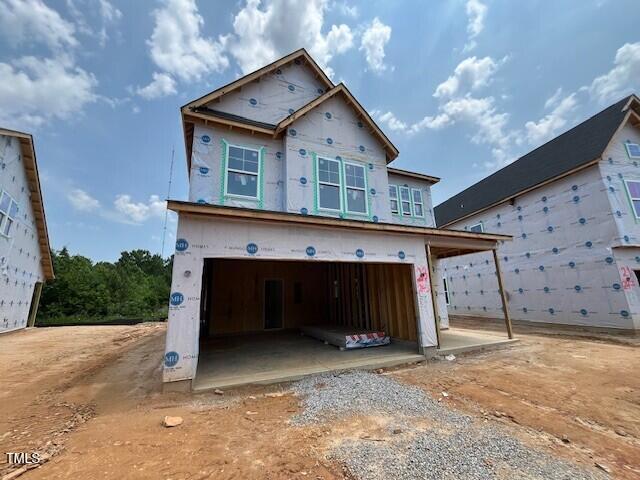 243 Meadowbark Bnd Unit 28, Garner, NC 27529 - property in mid-construction featuring a garage