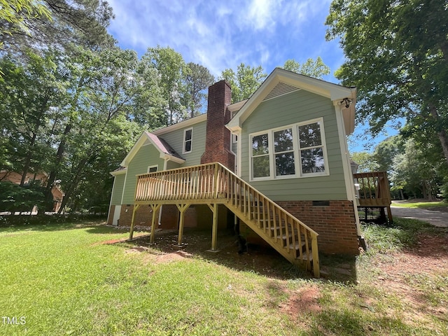 1116 Shadywood Ln, Raleigh, NC 27603 - rear view of house with stairway, a deck, a lawn, a chimney, and crawl space