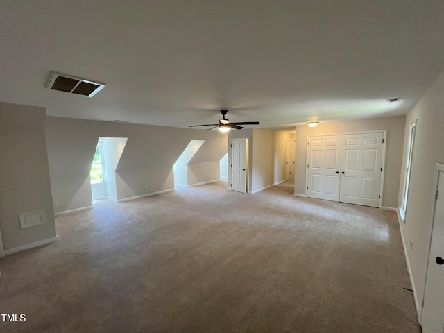 1116 Shadywood Ln, Raleigh, NC 27603 - additional living space with light colored carpet, ceiling fan, and baseboards