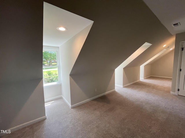 1116 Shadywood Ln, Raleigh, NC 27603 - bonus room featuring lofted ceiling, carpet flooring, baseboards, and recessed lighting