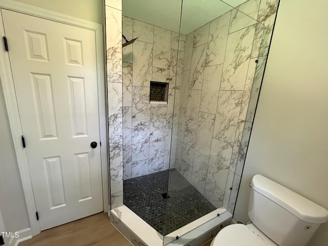 1116 Shadywood Ln, Raleigh, NC 27603 - full bath with a walk in shower, toilet, and wood finished floors
