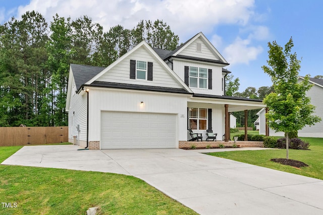 view of front of home featuring covered porch and driveway
