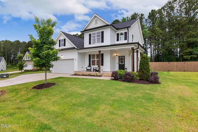 view of front of house featuring a porch, driveway, and an attached garage