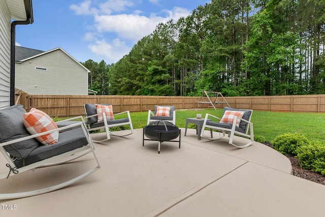 view of patio / terrace featuring a fire pit