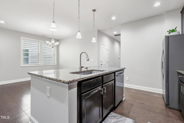 109 Belle Plain Dr, Morrisville, NC 27560 - kitchen featuring a sink, appliances with stainless steel finishes, baseboards, dark wood-type flooring, and recessed lighting