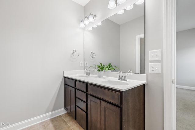 109 Belle Plain Dr, Morrisville, NC 27560 - bathroom featuring double vanity, baseboards, and tile patterned flooring
