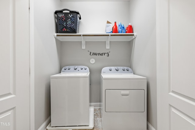 109 Belle Plain Dr, Morrisville, NC 27560 - washroom with washing machine and dryer and baseboards