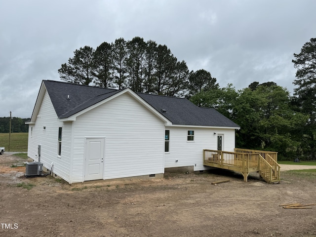 9600 Stallings Rd, Spring Hope, NC 27882 - rear view of house with crawl space, a shingled roof, a wooden deck, and central AC unit