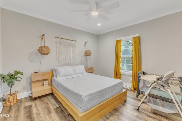 bedroom with light wood-style flooring, recessed lighting, ceiling fan, and baseboards