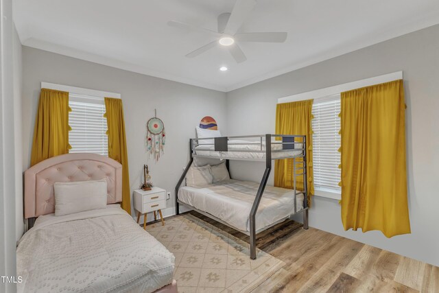 bedroom featuring light wood-type flooring, ceiling fan, and recessed lighting