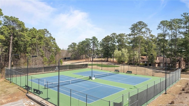 view of sport court with fence and community basketball court