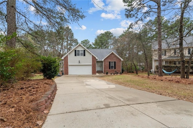 33 Woodbury Ln, Sanford, NC 27332 - traditional-style home with a front lawn, driveway, brick siding, and a garage