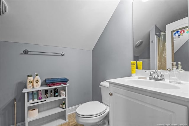 33 Woodbury Ln, Sanford, NC 27332 - bathroom featuring toilet, vaulted ceiling, baseboards, curtained shower, and vanity