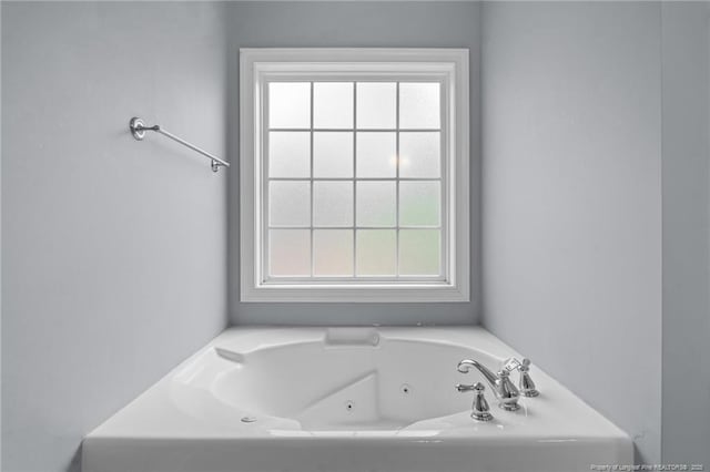 33 Woodbury Ln, Sanford, NC 27332 - bathroom with a jetted tub