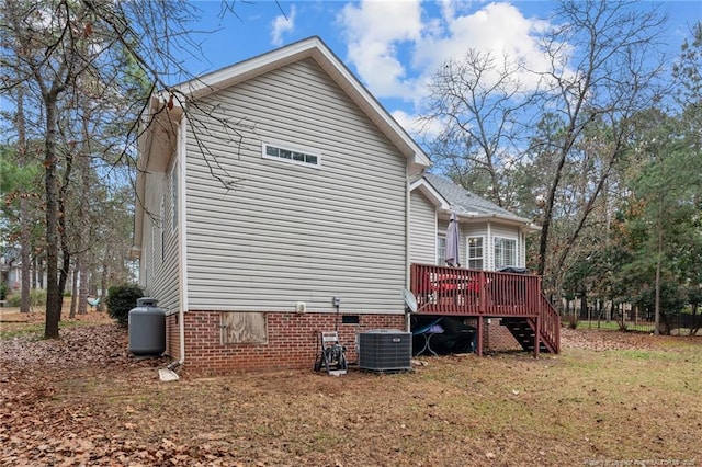 33 Woodbury Ln, Sanford, NC 27332 - view of side of home featuring central air condition unit, stairway, a deck, and crawl space