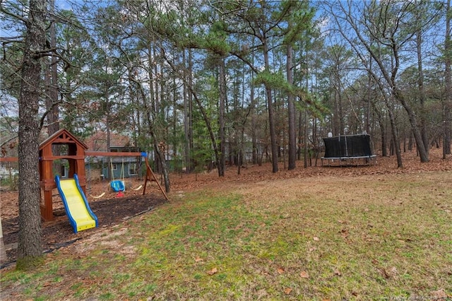 33 Woodbury Ln, Sanford, NC 27332 - view of yard featuring a trampoline and a playground