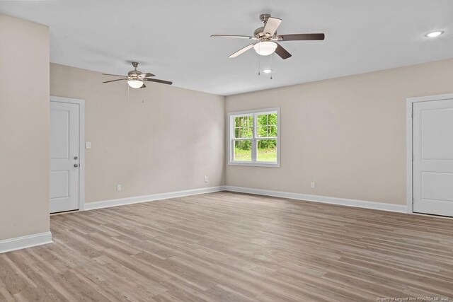 432 Timberline Dr, Fayetteville, NC 28311 - unfurnished room featuring ceiling fan, light wood finished floors, baseboards, and recessed lighting