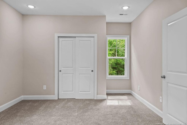 432 Timberline Dr, Fayetteville, NC 28311 - unfurnished bedroom with carpet, a closet, baseboards, and recessed lighting