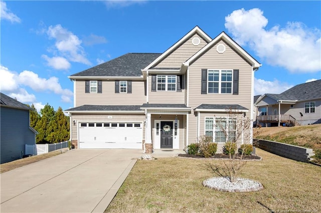 508 Rempstone Ln, Fayetteville, NC 28311 - traditional-style house with a shingled roof, fence, concrete driveway, a front yard, and an attached garage