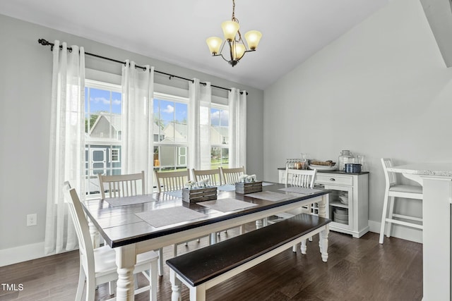 2801 Landon Ridge Dr, New Hill, NC 27562 - dining area with dark wood finished floors, vaulted ceiling, a wealth of natural light, and a chandelier
