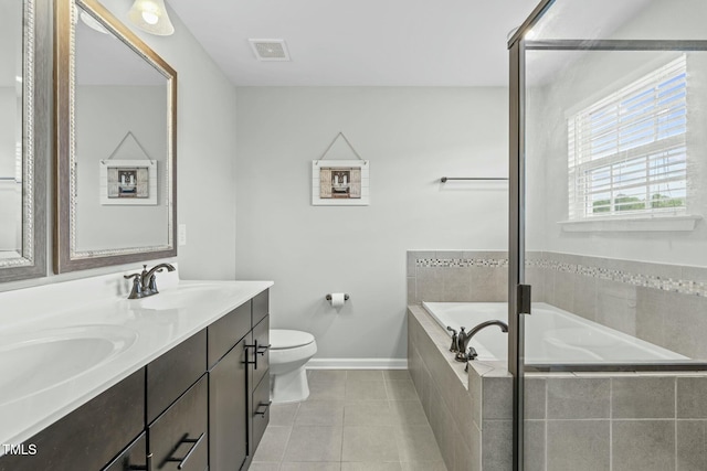 2801 Landon Ridge Dr, New Hill, NC 27562 - bathroom with tile patterned flooring, toilet, a garden tub, double vanity, and a sink